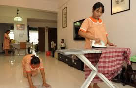 Filipino housekeeper at work in Manchester